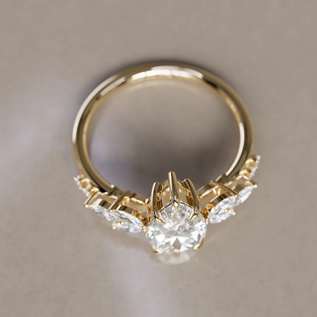 Nature Inspired Teardrop Engagement Ring With Side Stone Accents
